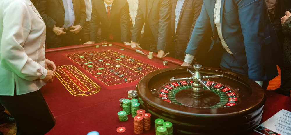 group people roulette gambling table luxury casino